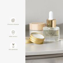 Load image into Gallery viewer, Cosmetic products with 'Navy' branding on a neutral background