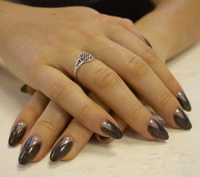 Load image into Gallery viewer, 137  Embellished Onyx  4.5G
DESCRIPTION
Black bronze metallic mixed with silver glitter
Colour Catalogue 
Product Guide 
Please refer to your colour sticks for the closest reflection of colo