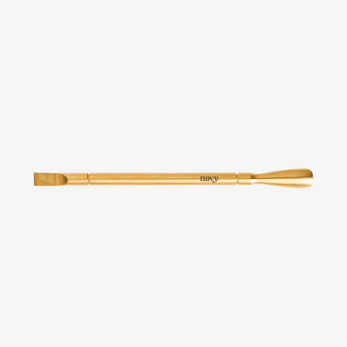 Gold-colored tool with 'navy' branding on a white background