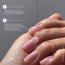Charger l&#39;image dans la galerie, Close-up of a hand with pink nails being filed, with text instructions on a gray background.