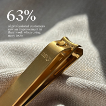 Charger l&#39;image dans la galerie, Gold nail clipper on a textured fabric background with text about customer feedback.