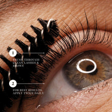 Load image into Gallery viewer, Close-up of an eye with false eyelashes being applied, showing application instructions.