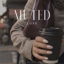 Load image into Gallery viewer, A person in a beige cardigan holds a black coffee cup and carries a dark brown shoulder bag, with the text 'MUTED LUXE' overlaid on the image.