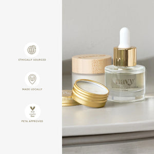 Cosmetic products with 'Navy' branding on a neutral background