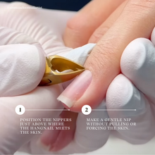 Load image into Gallery viewer, Close-up of hands with gloves using cuticle nippers on a white background