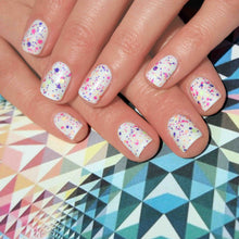 Load image into Gallery viewer, 204 Kaleidoscope 4.5G
DESCRIPTION


A clear gel with different sized pink, violet, indigo, orange and lime hexagon-shaped fragments encased within it

Colour Catalogue
Product Guide 

Pl